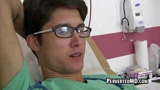 This sexy hunk doctor is getting blown in the office - porn video